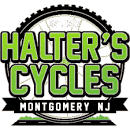 A green and white logo for halters cycles.